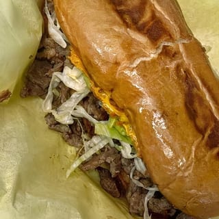 Asada Torta - Beans, Cheese, Guacamole, Lettuce, Carne Asada, Salsa Fresca - O