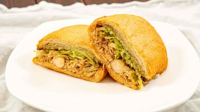Chicken Torta - Beans, Cheese, Guacamole, Lettuce, Chicken.